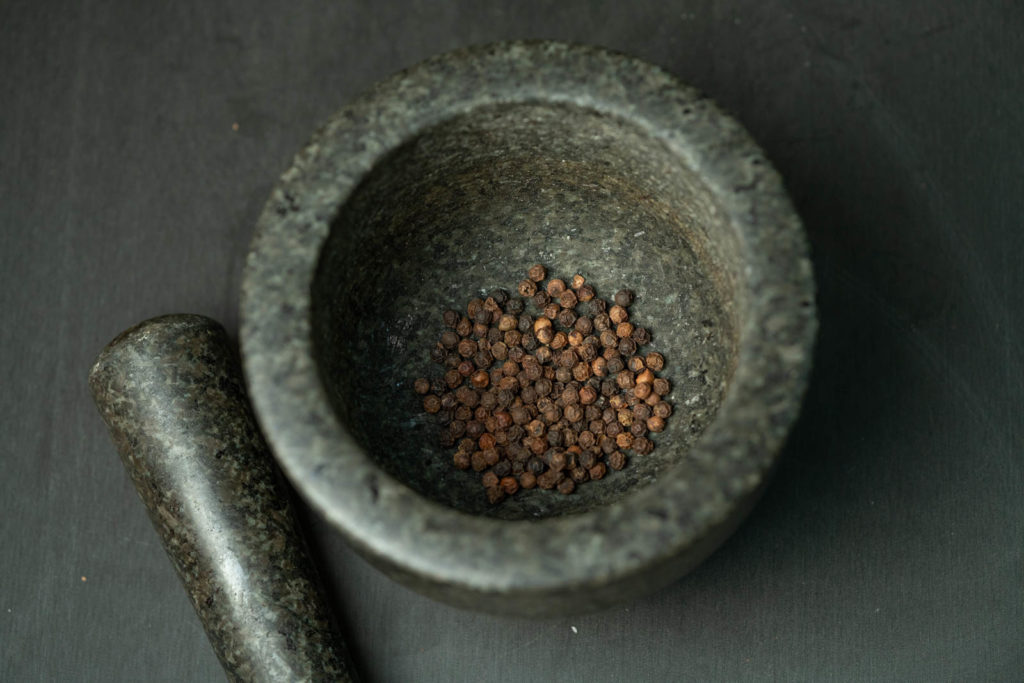 Coarsely grind your peppercorn