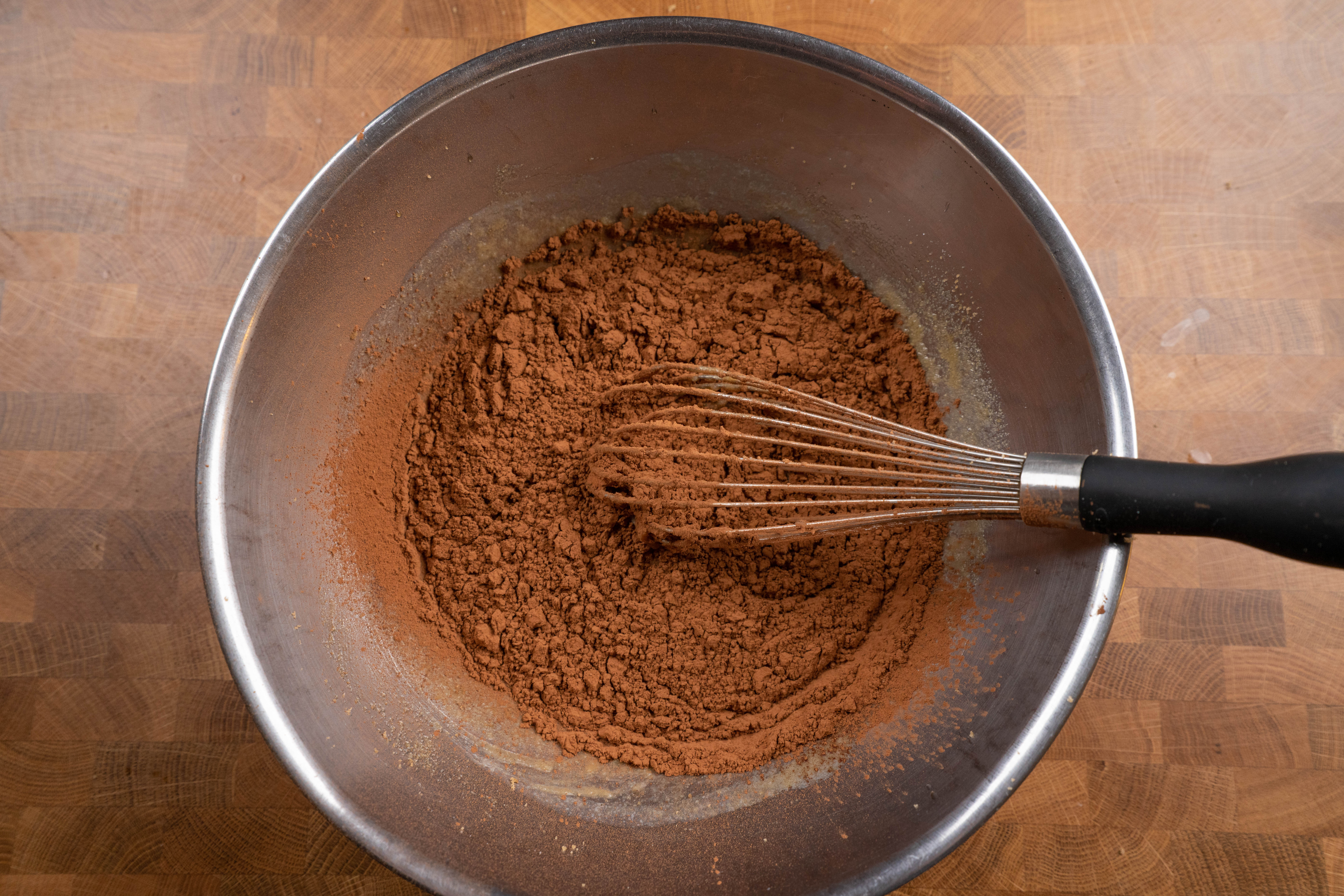 Alton Brown Brownies: sift in cocoa