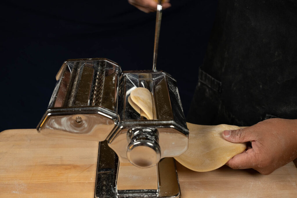 Run dough through pasta machine
