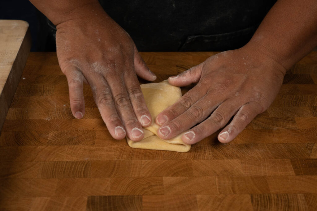 Fold dough in thirds