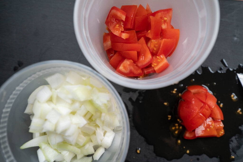 Baigan Bhartha: Chop tomatoes and onion