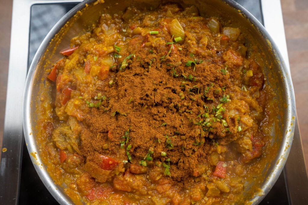 Baigan Bhartha: Add garam masala and cilantro